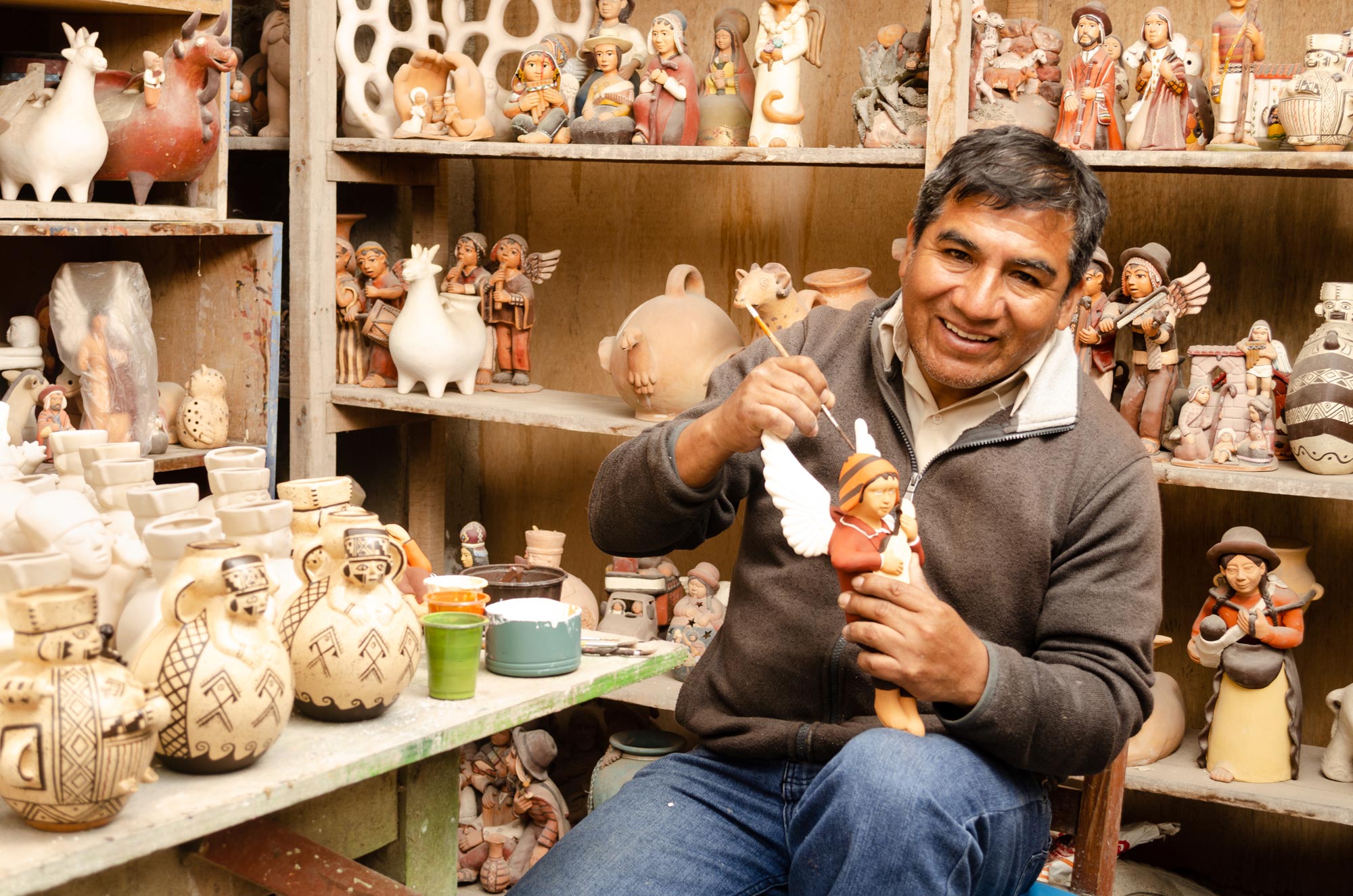 Cultural Ceramic Nativity Scene on a Canoe from Peru - Canoe Voyage