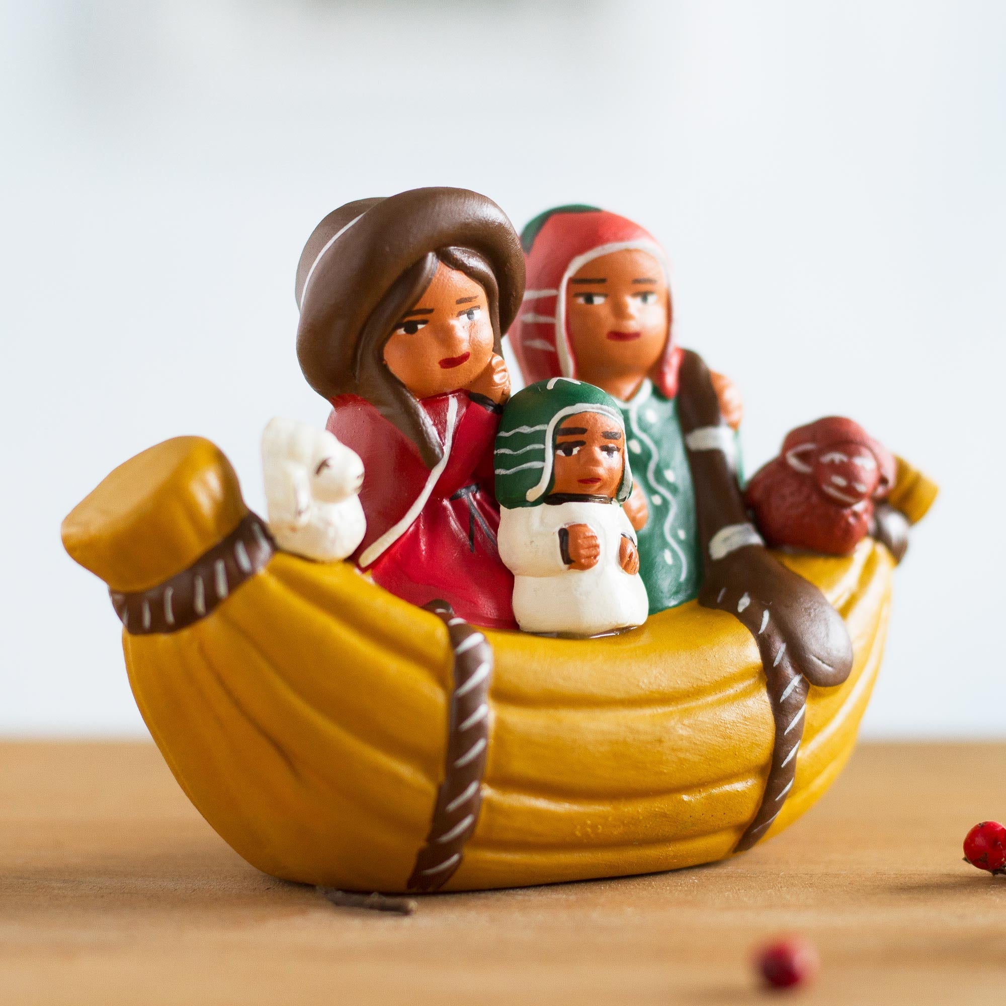 Cultural Ceramic Nativity Scene on a Canoe from Peru - Canoe Voyage